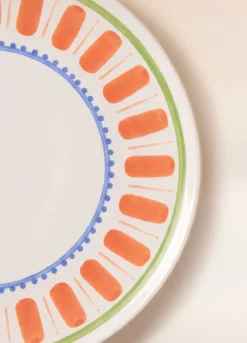 Piatto da pizza in ceramica con orlo decorato