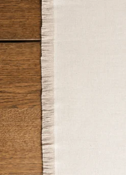 Runner in cotone con frange